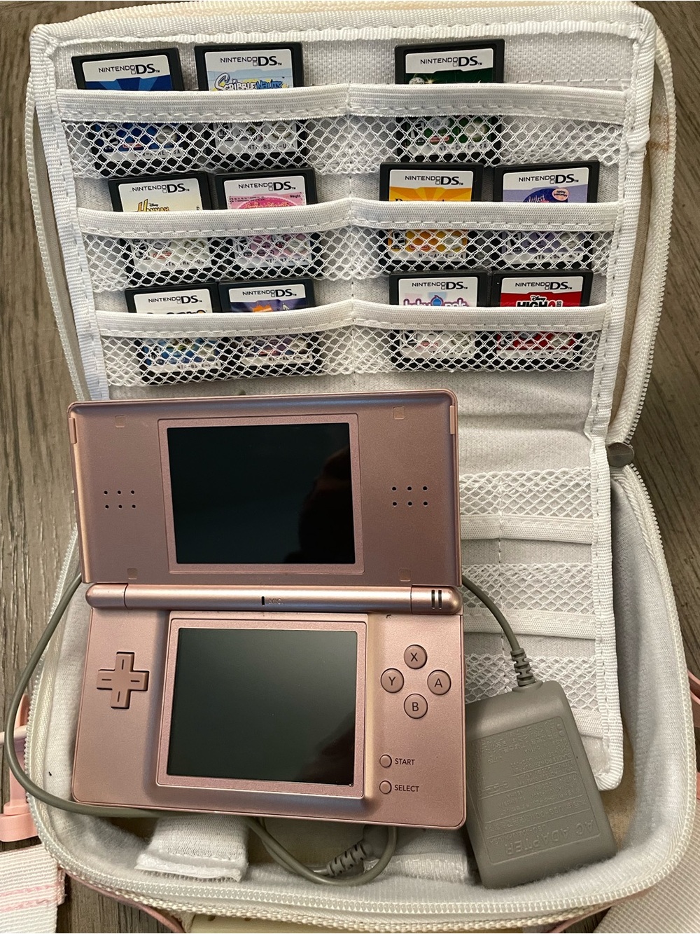 Nintendo DS Lite, Metallic Rose, carrying case and 11 games!